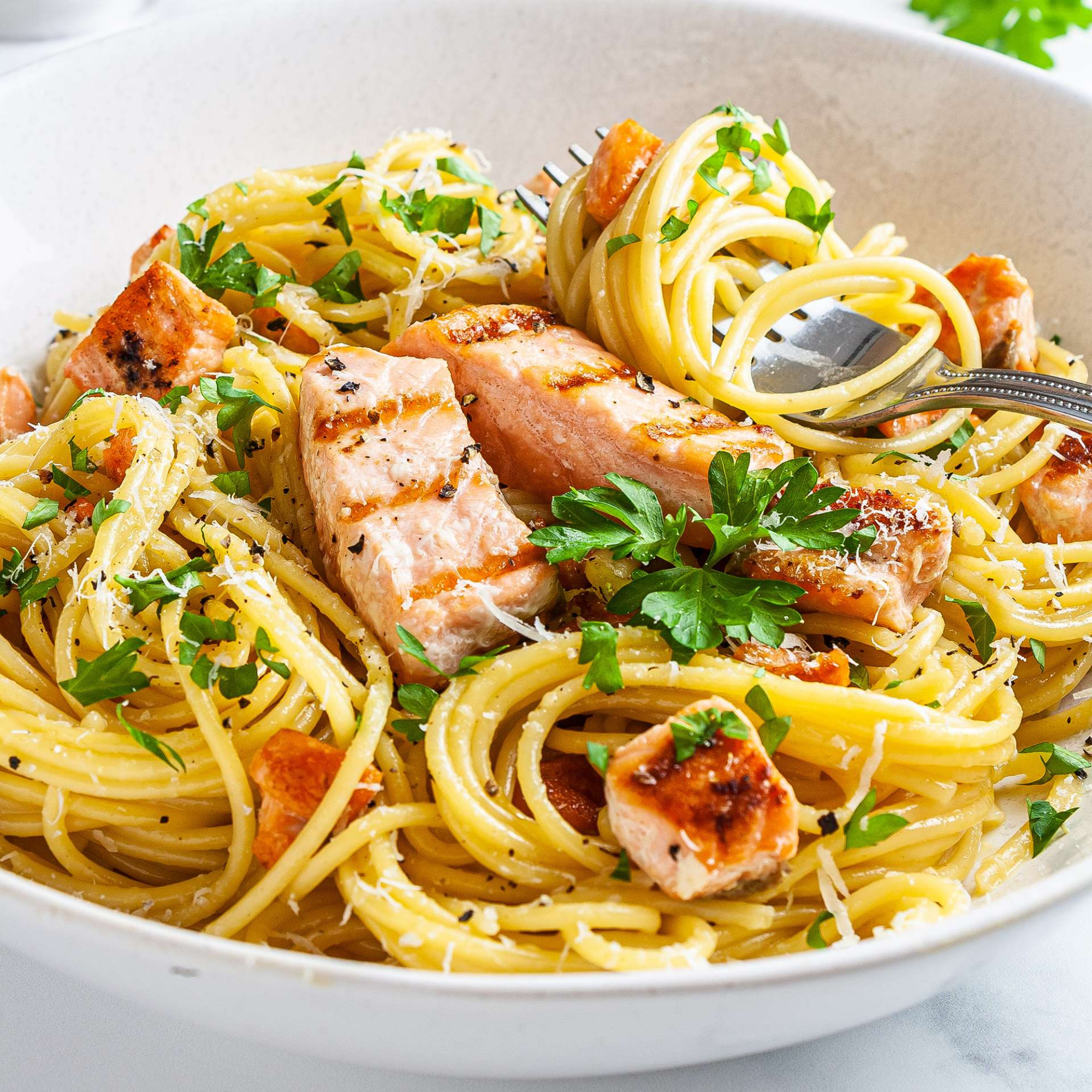 Salmon Pasta Aglio e Oiio with 2 pieces Salmon garlic olive oil parsely Parmesan